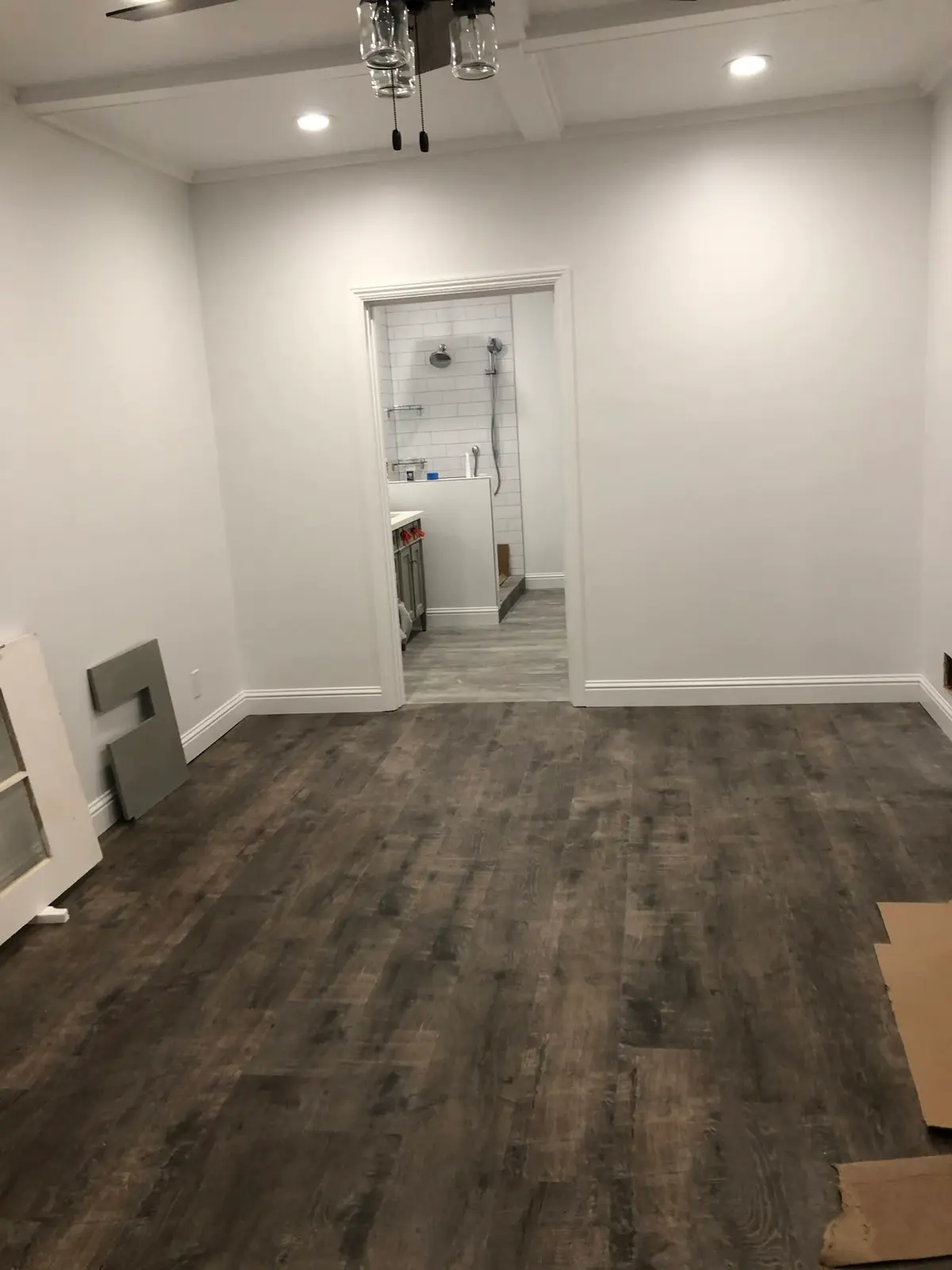 Flooring installation in Vallejo: new dark vinyl plank flooring in a refinished room