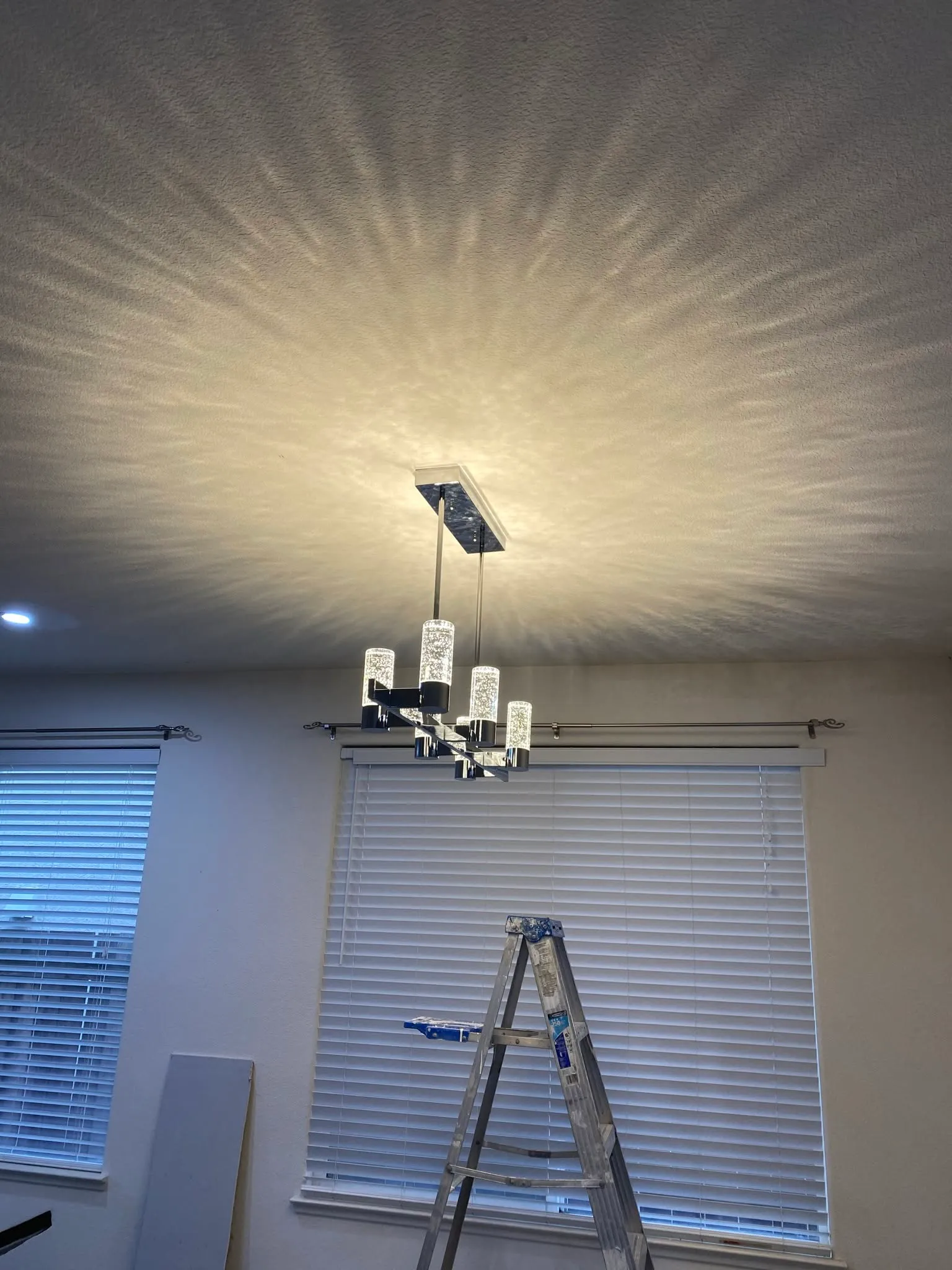 Modern chandelier installed by E&MC Remodeling in a Vallejo home