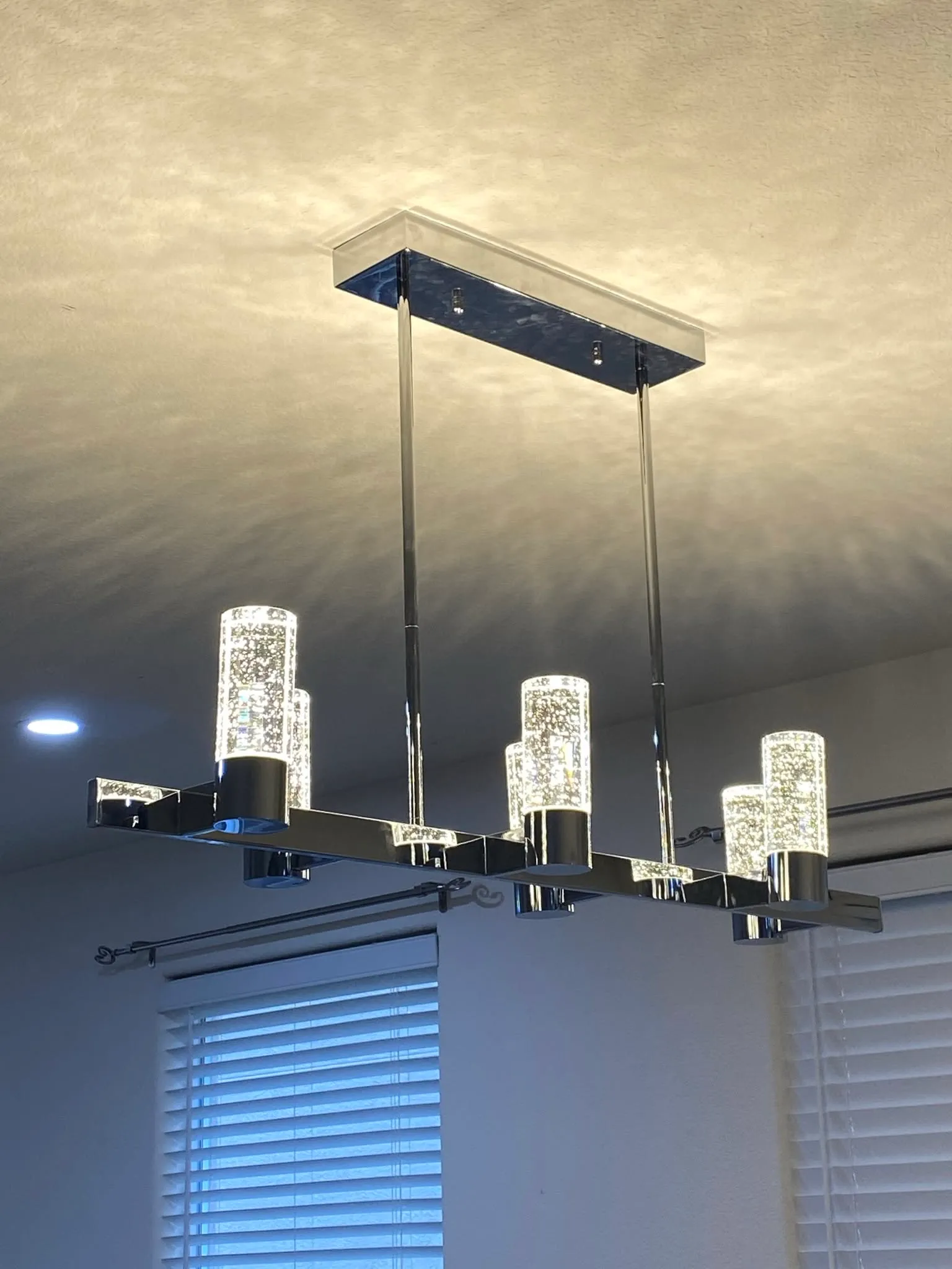 Crystal bubble chandelier installed over a Vallejo dining area