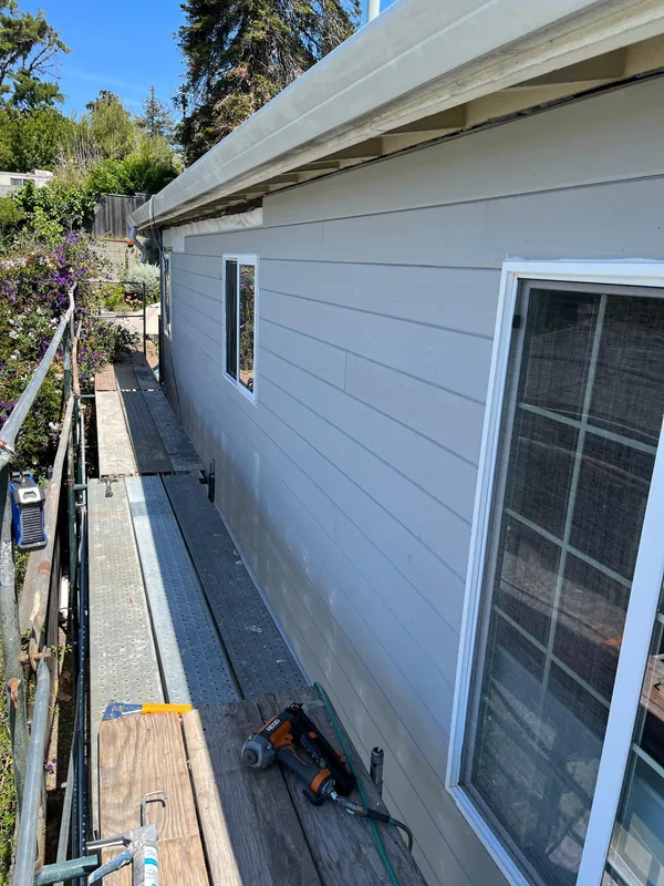 New gray lap siding and window trim on a Vallejo home
