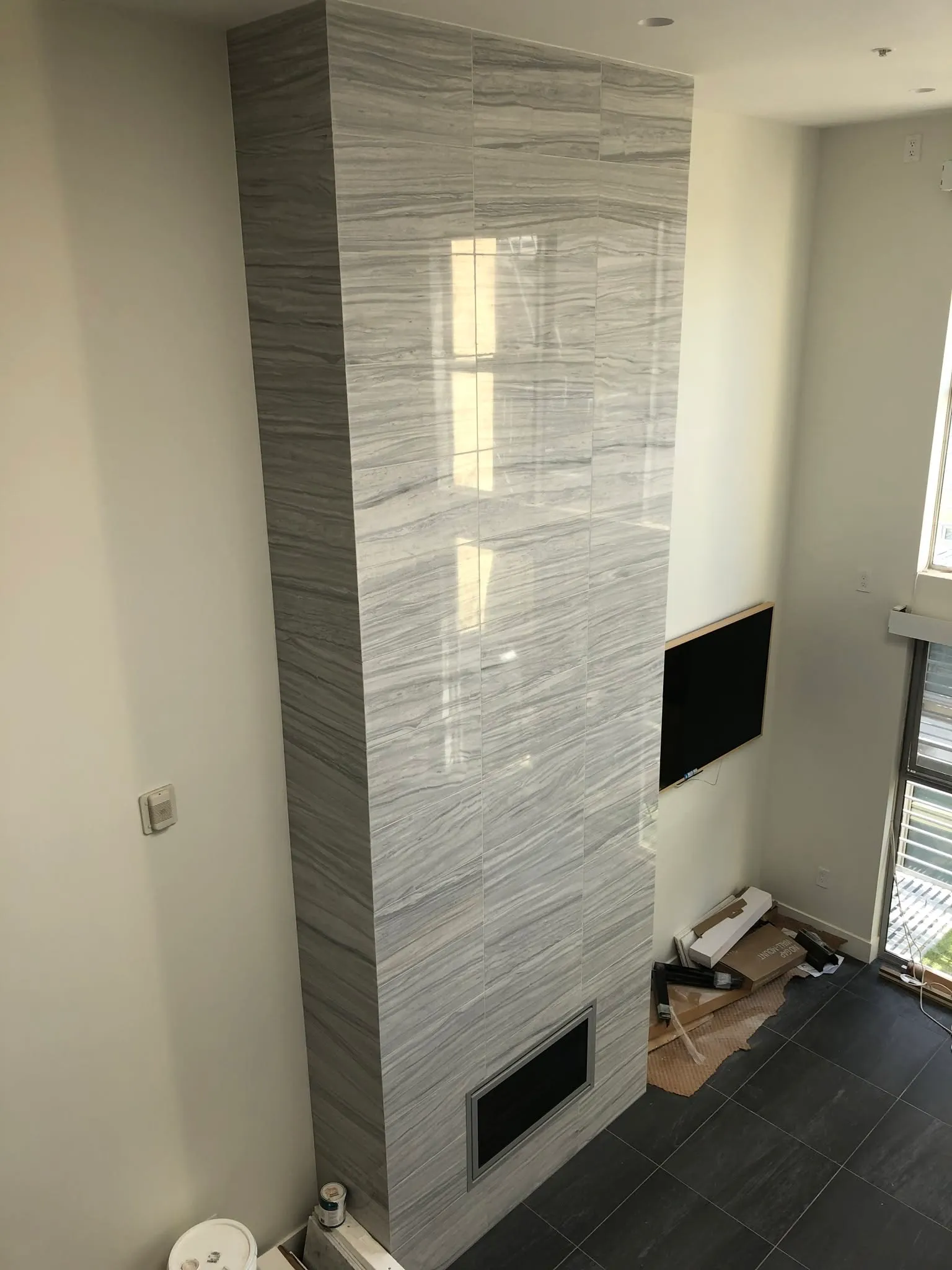 Tiled column finished with striped porcelain tile in a Vallejo home
