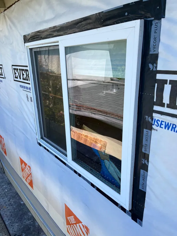 New window installed through housewrap on a Vallejo remodel