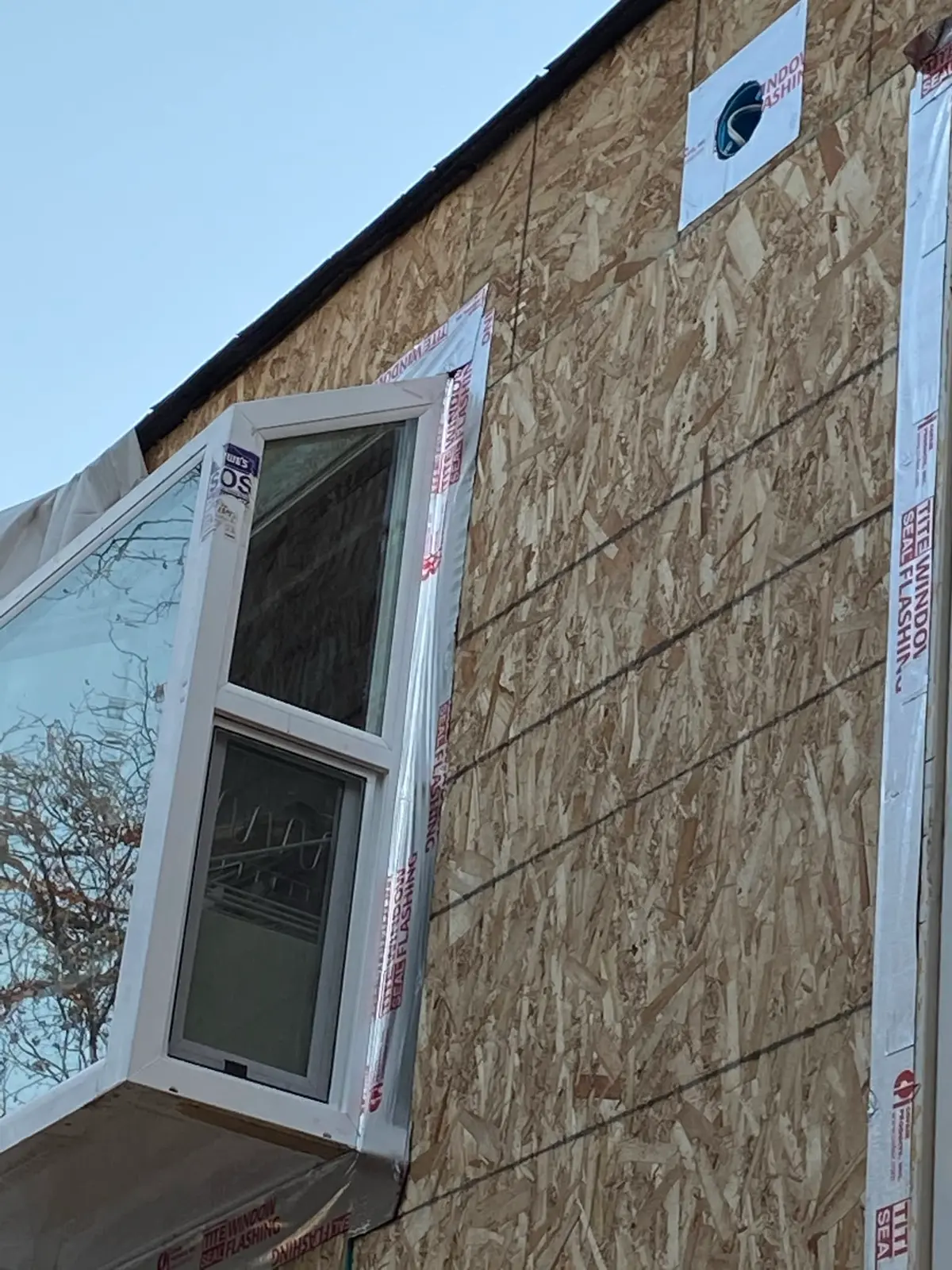 Window installation in Vallejo: new window in sheathing with flashing
