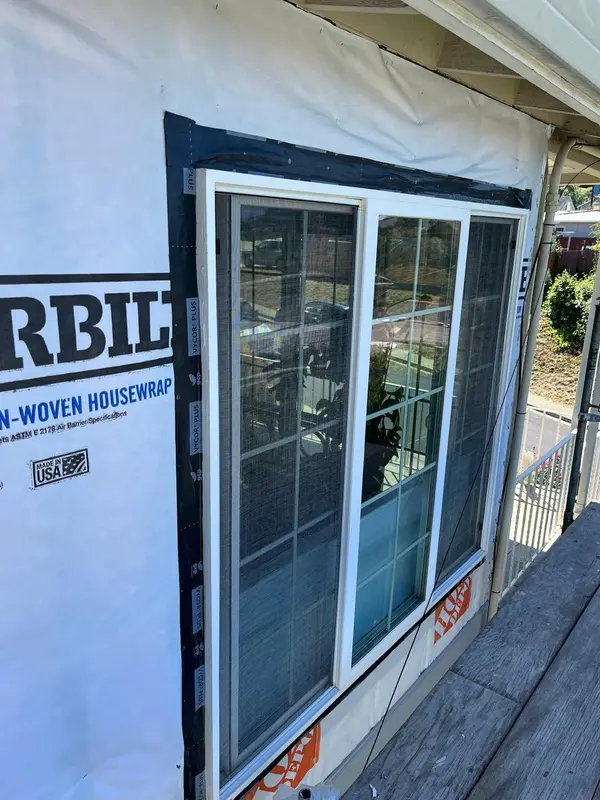 Window installation in Vallejo with sliding glass window set in house wrap